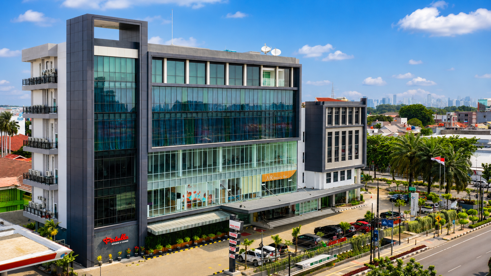 Tampilan gedung Luxury Inn Arion Hotel Jakarta dengan desain modern dan fasilitas hotel bintang 4